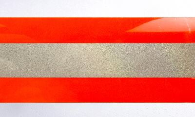 Bande réfléchissante ignifuge thermocollante orange-argent