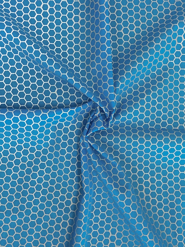 Tecido reflexivo com impressão hexagonal