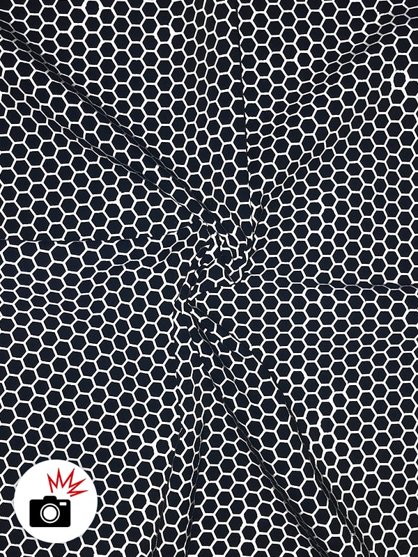 Tecido reflexivo com impressão hexagonal