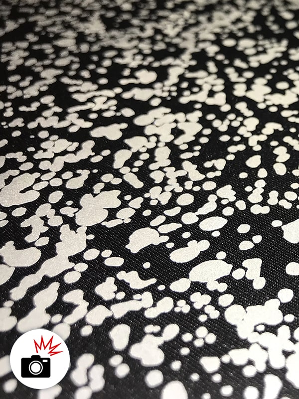 Pontos irregulares imprimindo tecido reflexivo